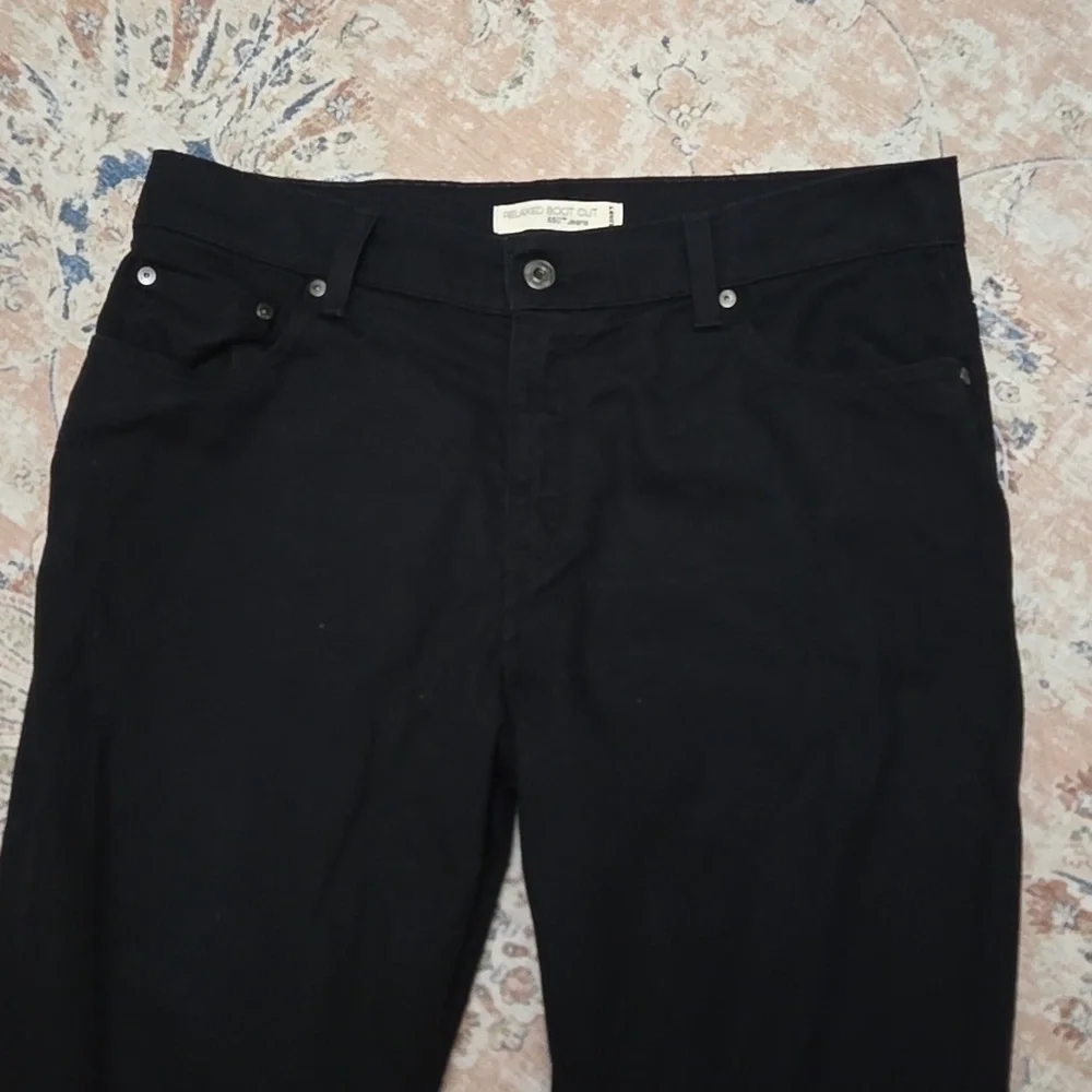Levi's 550 relaxed boot cut Black jeans classic 5 pocket stretch 12 M Excellent…